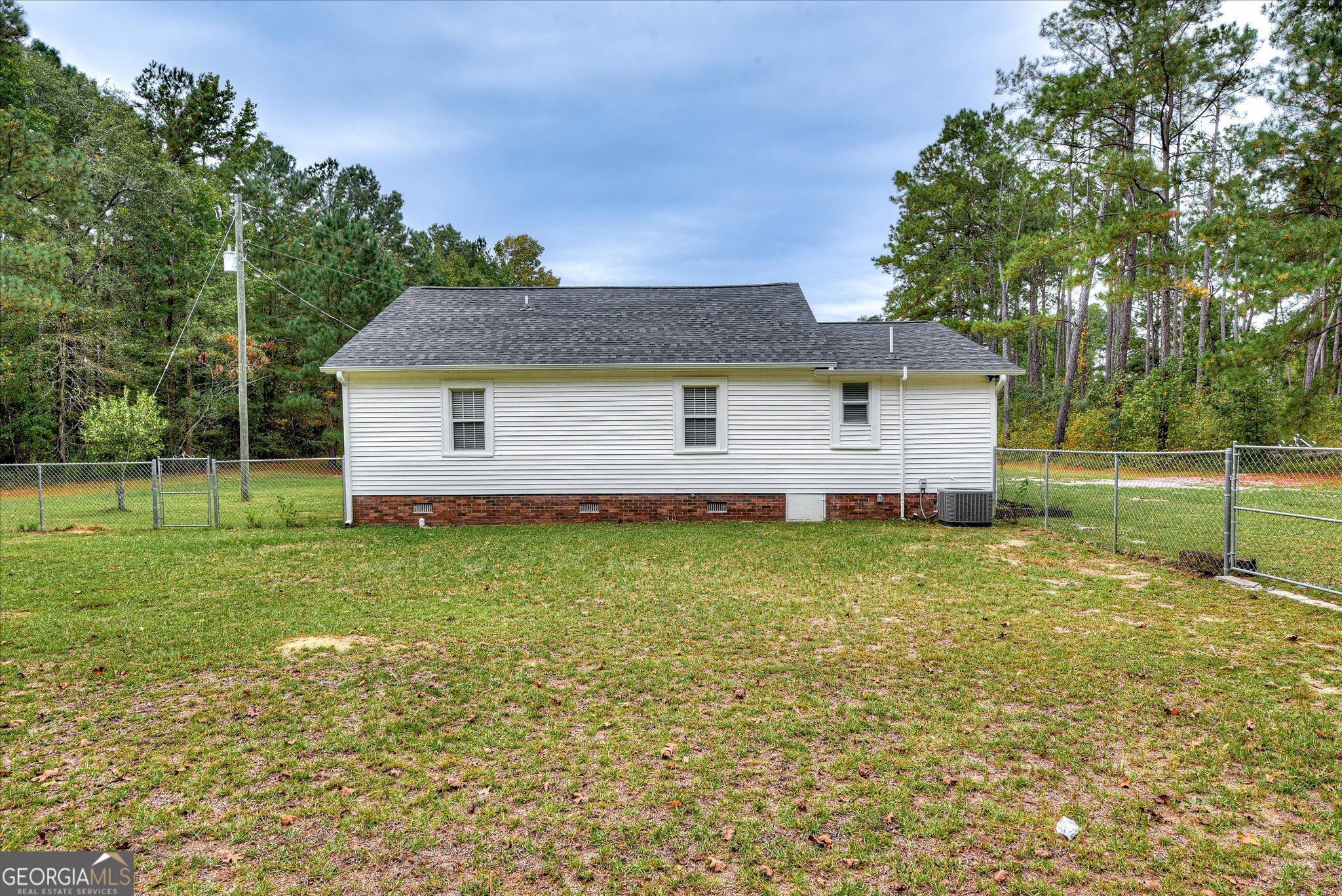 1321 Brett Road Wadley, GA 30477 - Photo 41 of 47 a view of a backyard with a garden