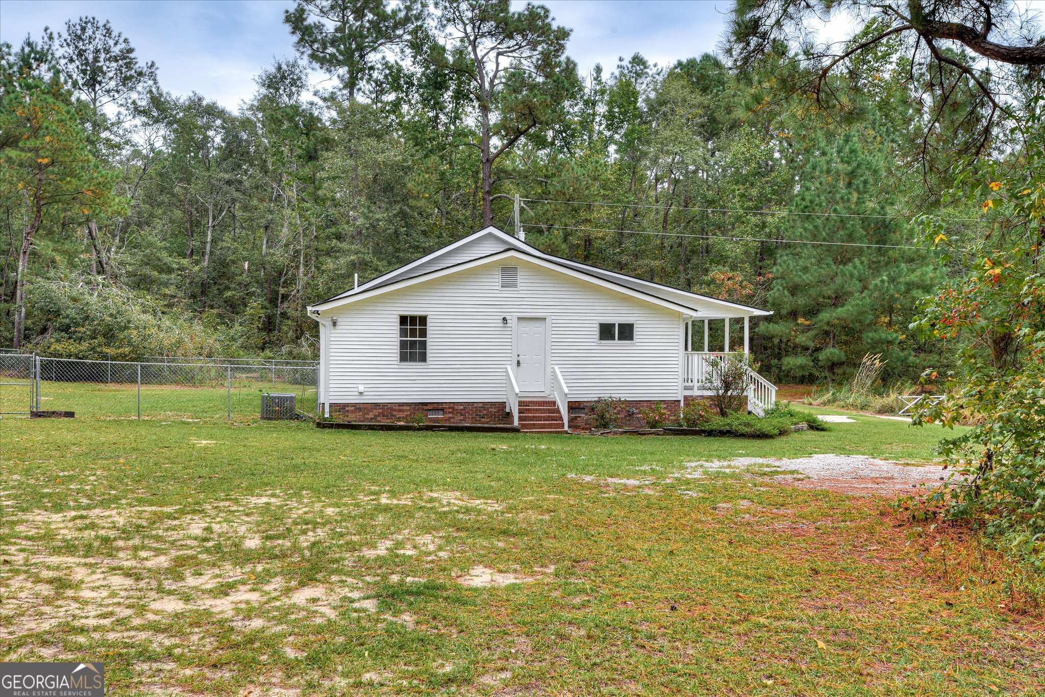 1321 Brett Road Wadley, GA 30477 - Photo 44 of 47 a view of a backyard with a garden