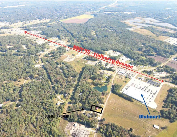 a view of balcony with wooden floor