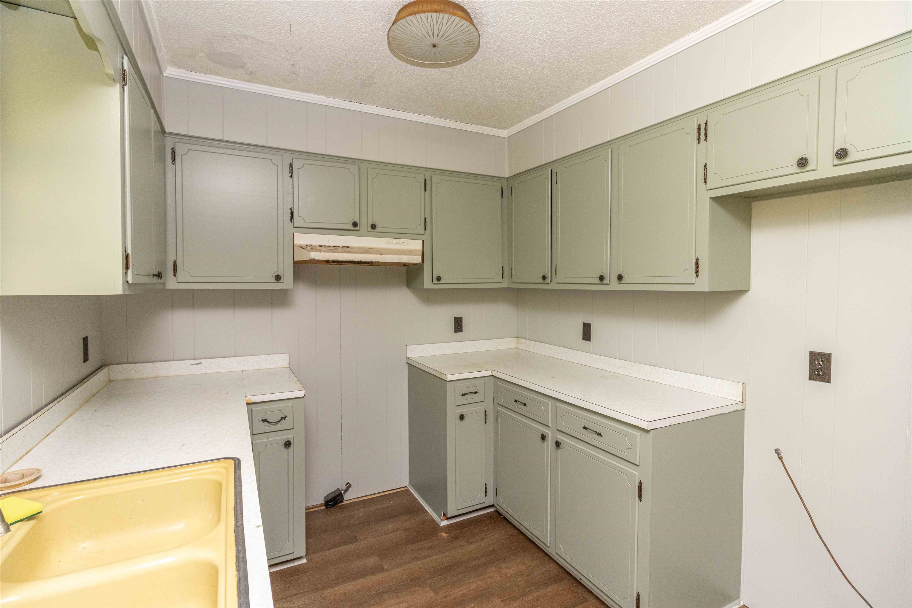 147 Jones Street Selmer, TN 38375 - Photo 8 of 19 a view of a storage & utility room with a sink