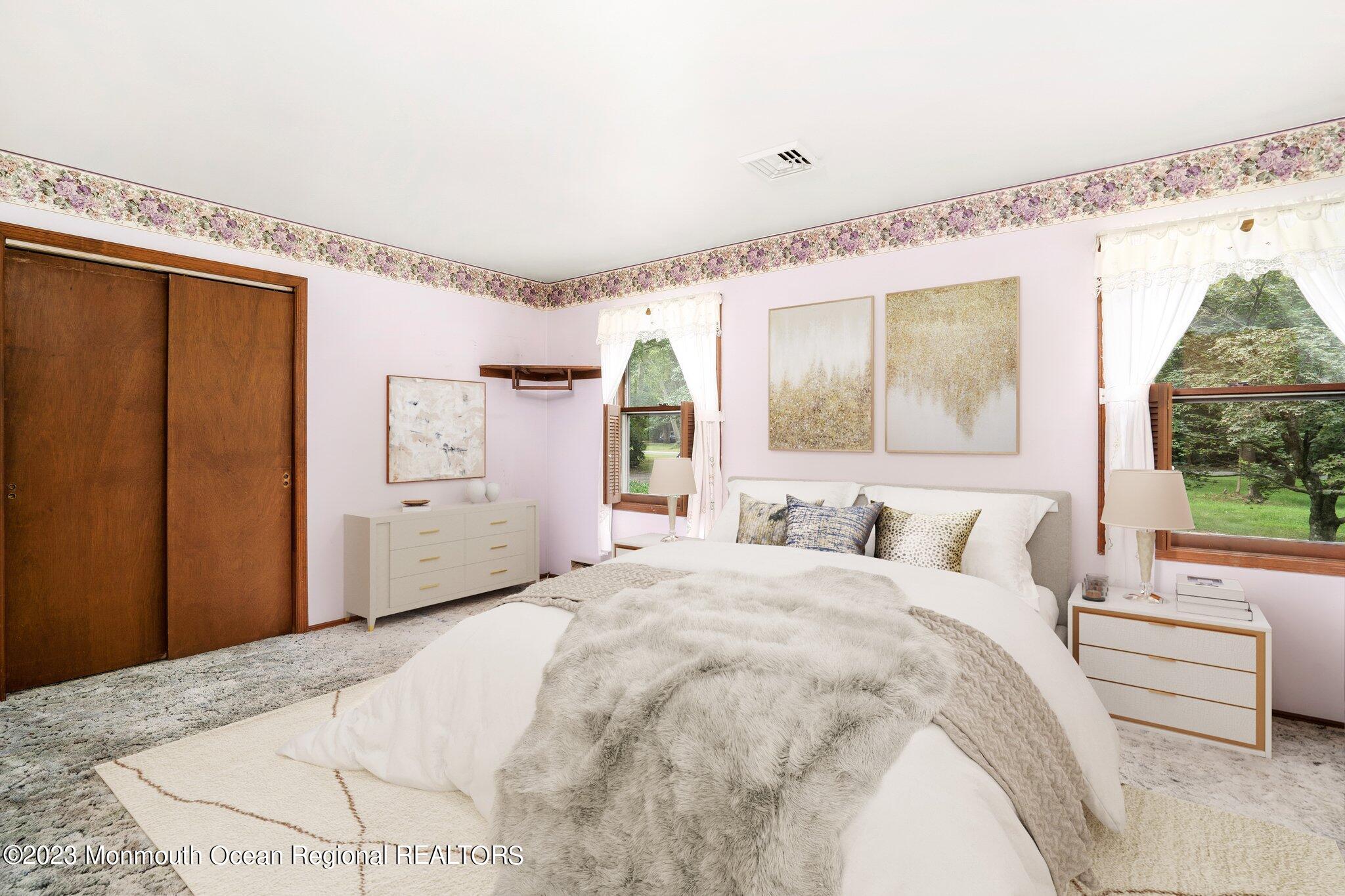 201 West Millstream Road Cream Ridge, NJ 08514 - Photo 22 of 41 a bedroom with a large bed and a window