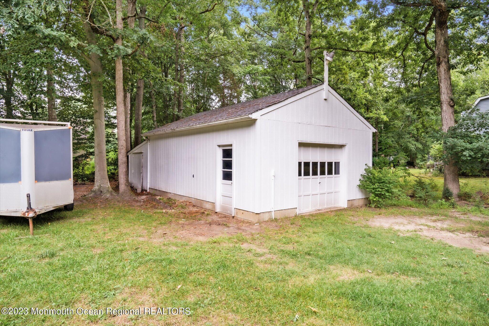 201 West Millstream Road Cream Ridge, NJ 08514 - Photo 33 of 41 a view of a house with backyard and garden