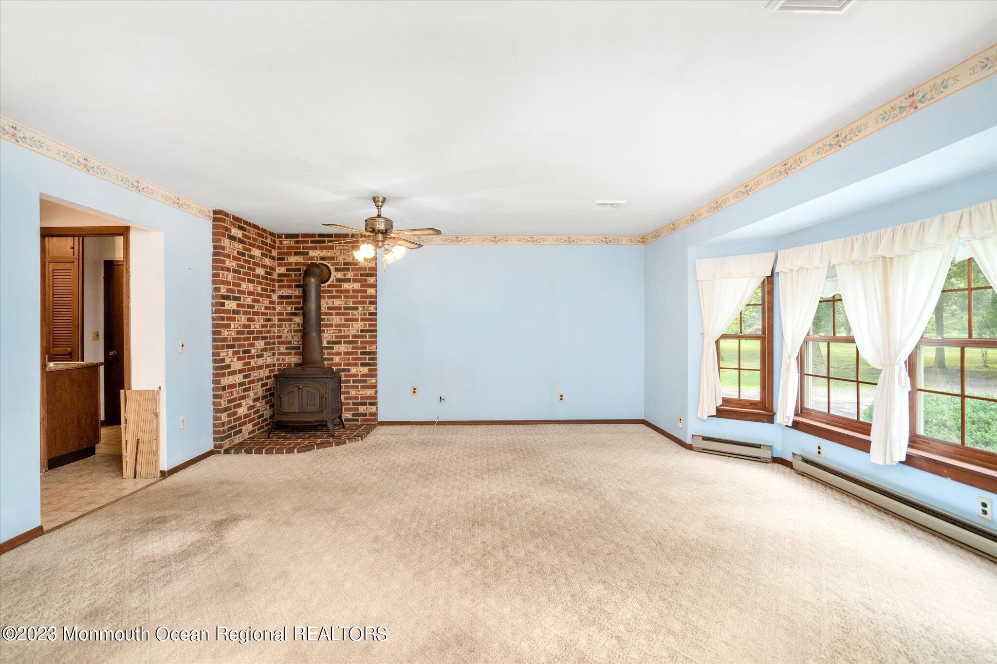 201 West Millstream Road Cream Ridge, NJ 08514 - Photo 9 of 41 a view of an empty room with a window
