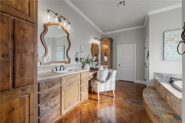 a living room with granite countertop furniture and a mirror