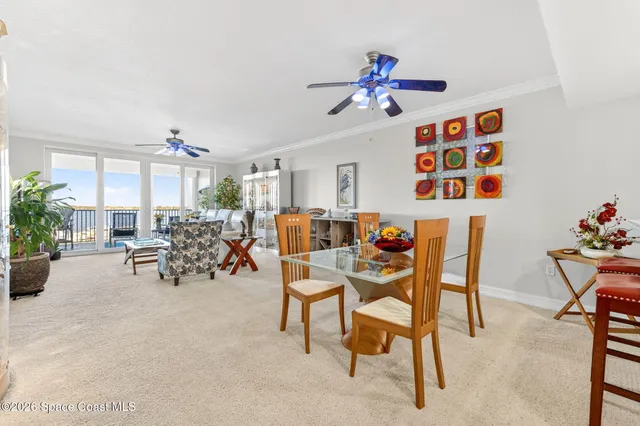 a view of yard with tree in the background