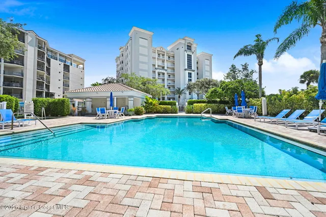 a view of an buildings with swimming pool