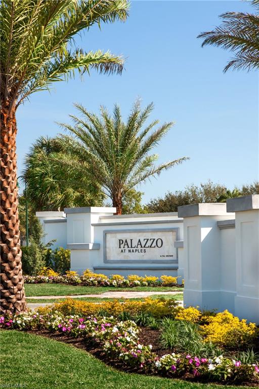 10071 Palazzo Drive Naples, FL 34119 - Photo 1 of 1 a view of a water with a building in the background