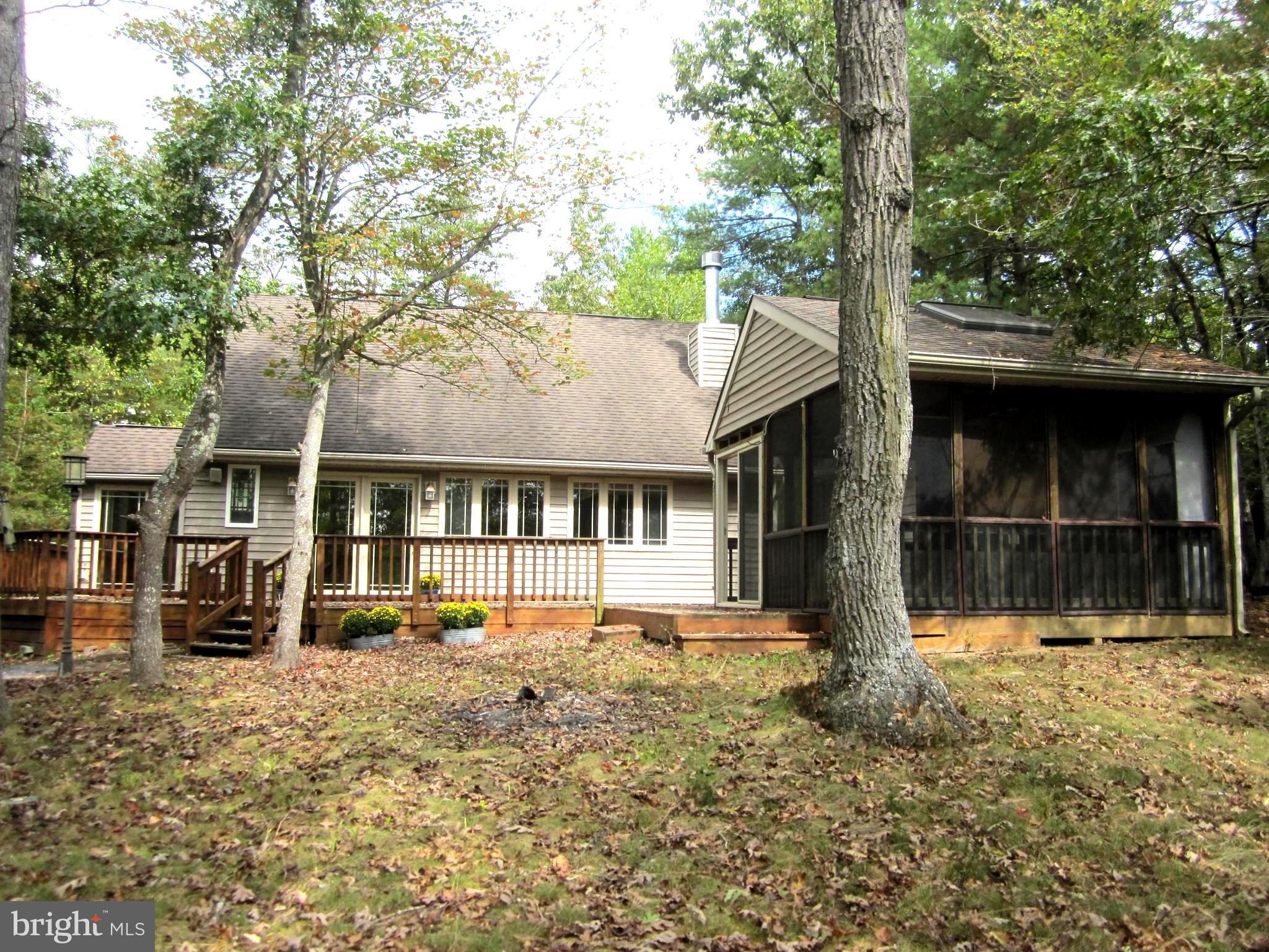 17 Davis Court Basye, VA 22810 - Photo 2 of 18 a front view of a house with a yard