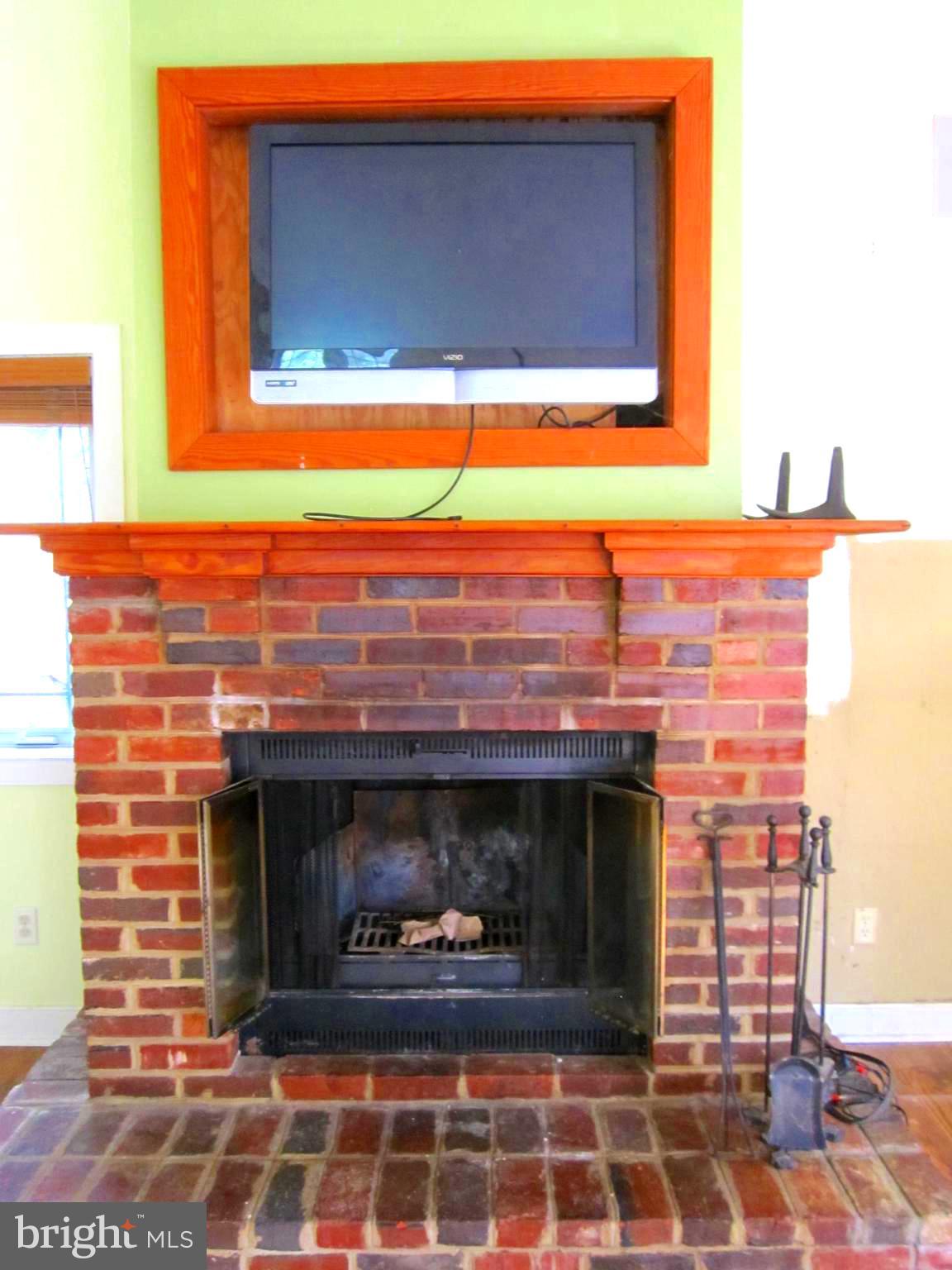 17 Davis Court Basye, VA 22810 - Photo 9 of 18 a closeup of a fireplace