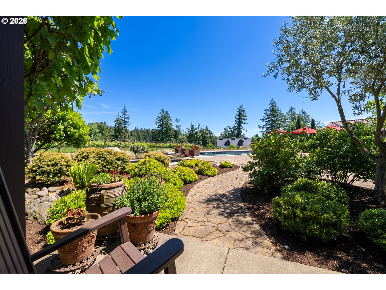 30460 Northeast Bell Road Newberg, OR 97132 - Photo 23 of 48 a view of a yard with many potted plants