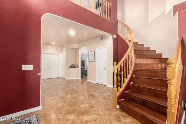 a en suite bathroom with a sink and a mirror