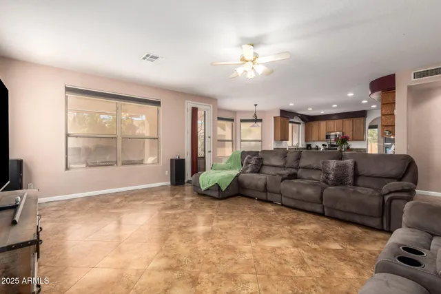 a bathroom with a sink a toilet and shower curtain