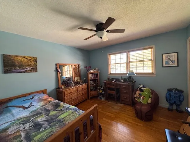 a view of a livingroom with furniture and a flat screen tv