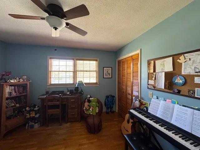 a living room with furniture fireplace and flat screen tv