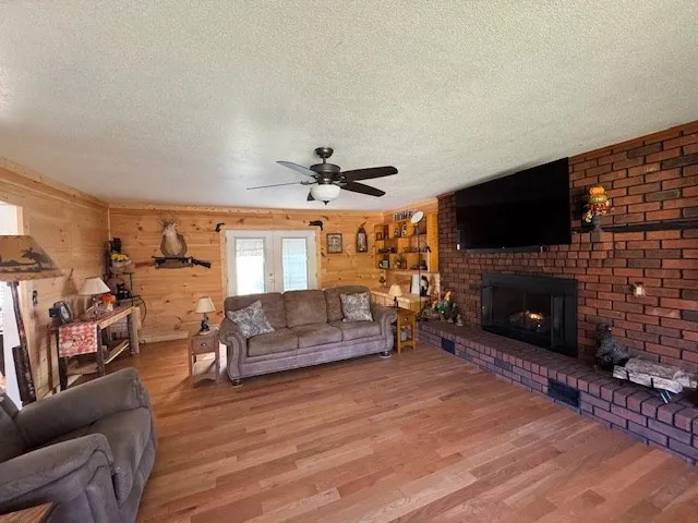 a room with lots of furniture and a rug