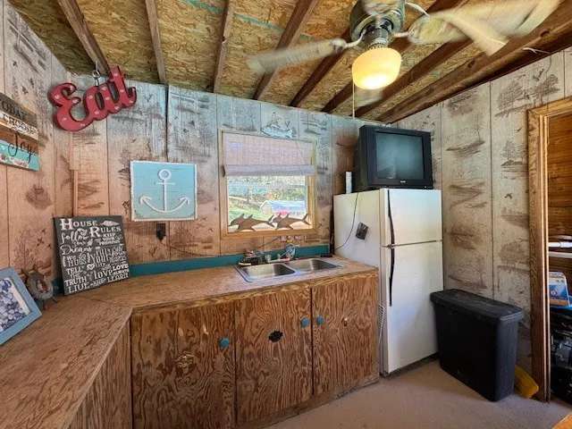 a view of a large body of water with a building in the background