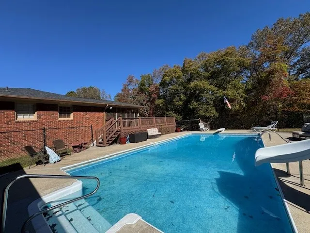 a view of a town with mountains in the background