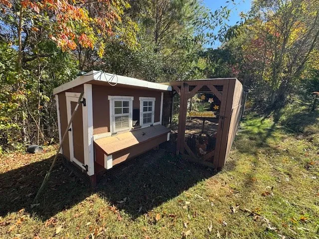 a view of a yard with an outdoor space