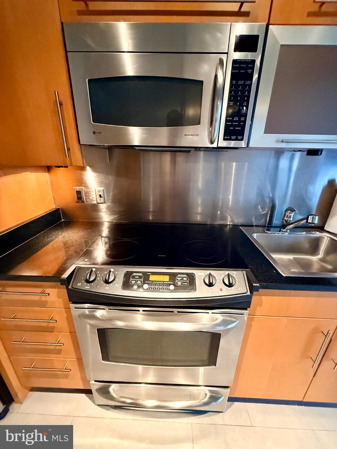 1133 14th Street Northwest, Unit 503 Washington, DC 20005 - Photo 7 of 29 Sleek kitchen with modern appliances.