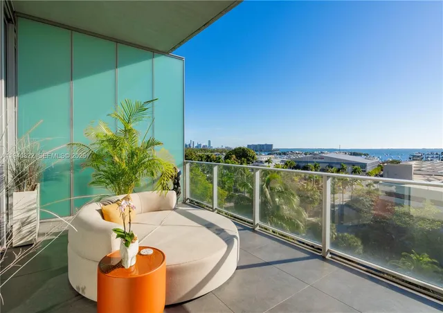 a view of a swimming pool with a lounge chair