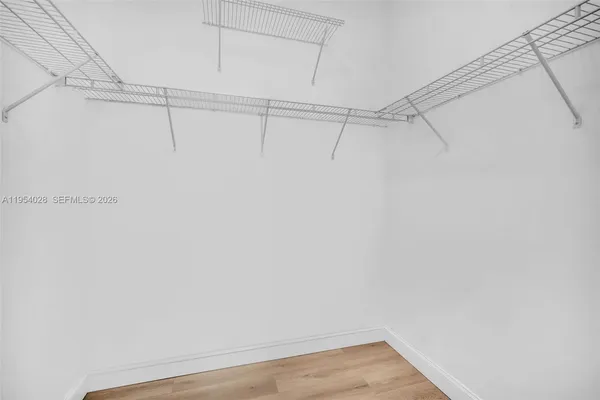 a kitchen with granite countertop a stove and a sink