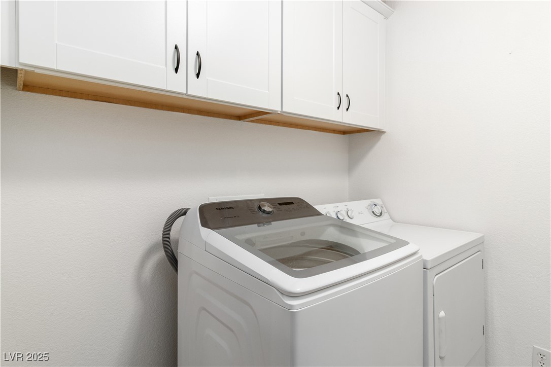 3155 Quail Song Drive Laughlin, NV 89029 - Photo 42 of 85 Washroom with cabinet space and separate washer and dryer