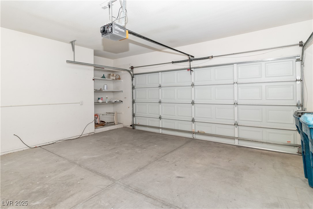3155 Quail Song Drive Laughlin, NV 89029 - Photo 44 of 85 Garage with a garage door opener