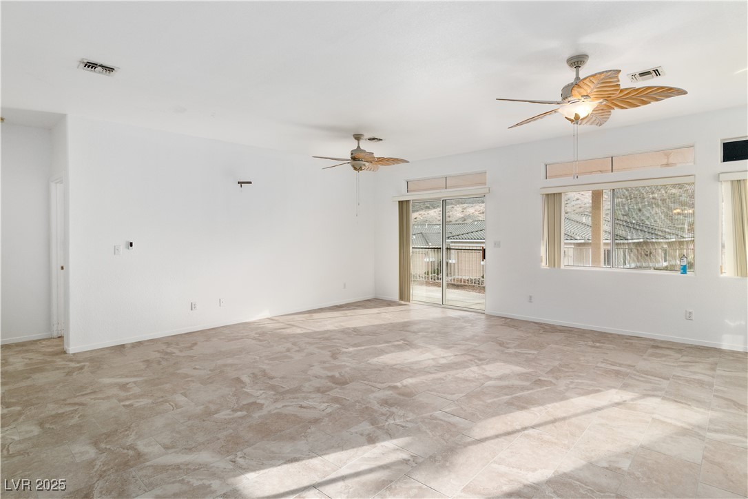 3155 Quail Song Drive Laughlin, NV 89029 - Photo 9 of 85 Great room with ceiling fans