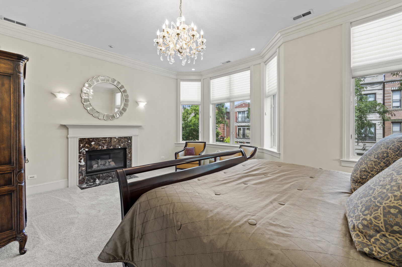 1423 West Lexington Street Chicago, IL 60607 - Photo 19 of 36 a bedroom with bed and a chandelier