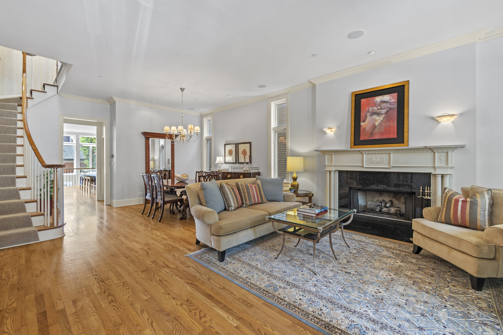 1423 West Lexington Street Chicago, IL 60607 - Photo 2 of 36 a living room with furniture and a fireplace
