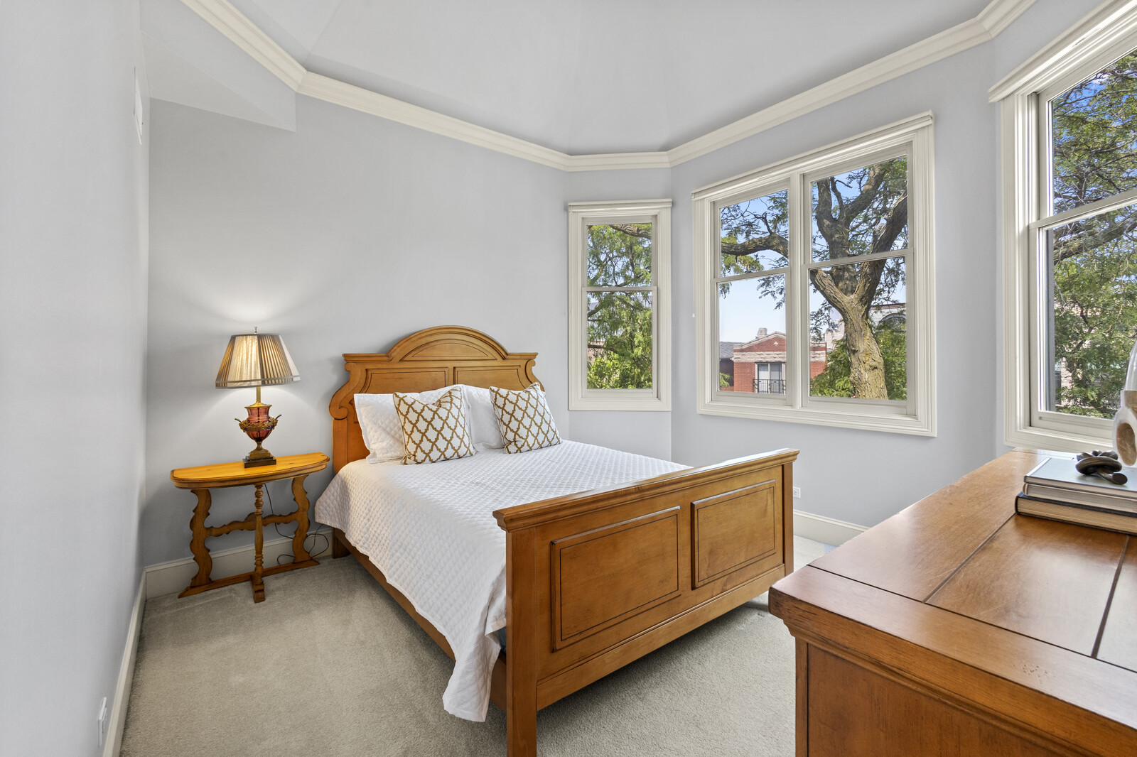 1423 West Lexington Street Chicago, IL 60607 - Photo 26 of 36 a bedroom with a bed and a window