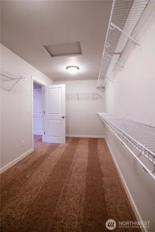 a view of a room with racks on the wall