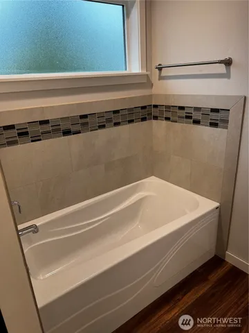 a view of a backyard with large trees