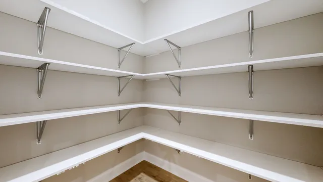 a view of a room with racks on the wall