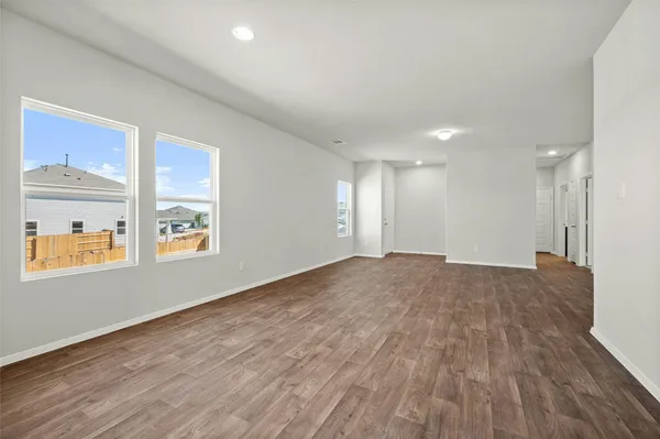 a view of an empty room and window