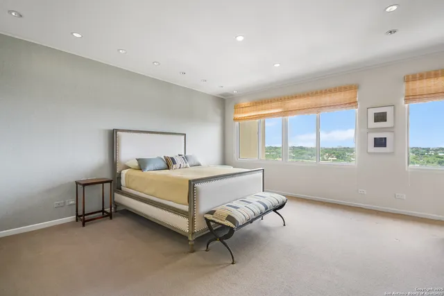 a bed room with a bed and a window