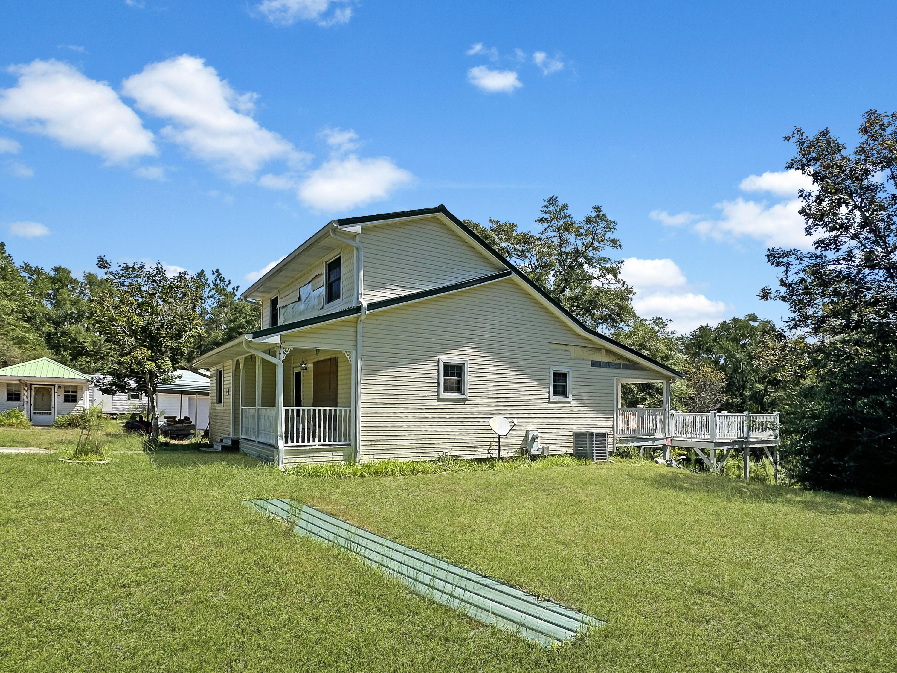 6119 Clear Creek Road Crestview, FL 32539 - Photo 11 of 46 a front view of house with yard and green space