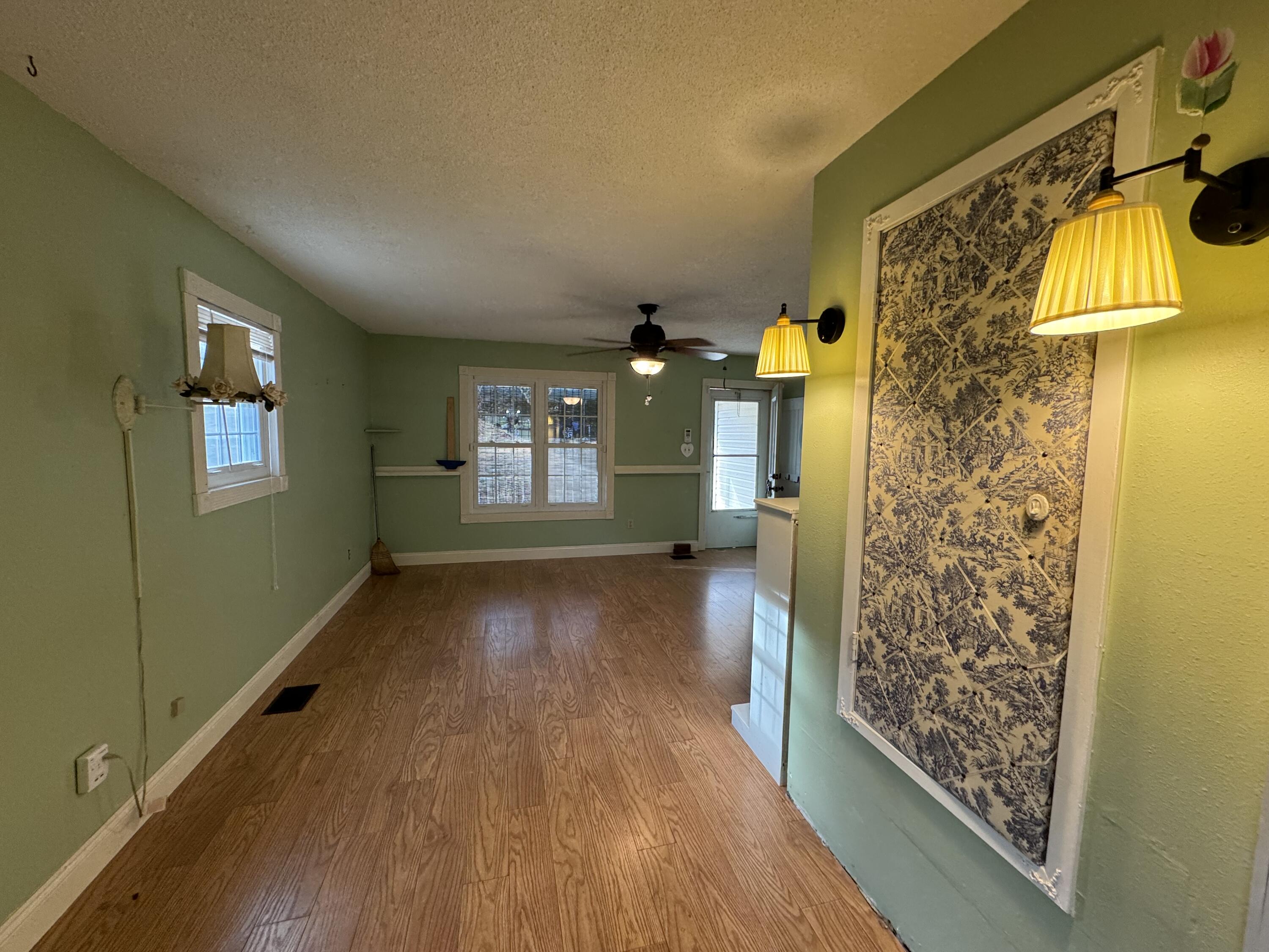 6119 Clear Creek Road Crestview, FL 32539 - Photo 3 of 46 a view of hallway with wooden floor