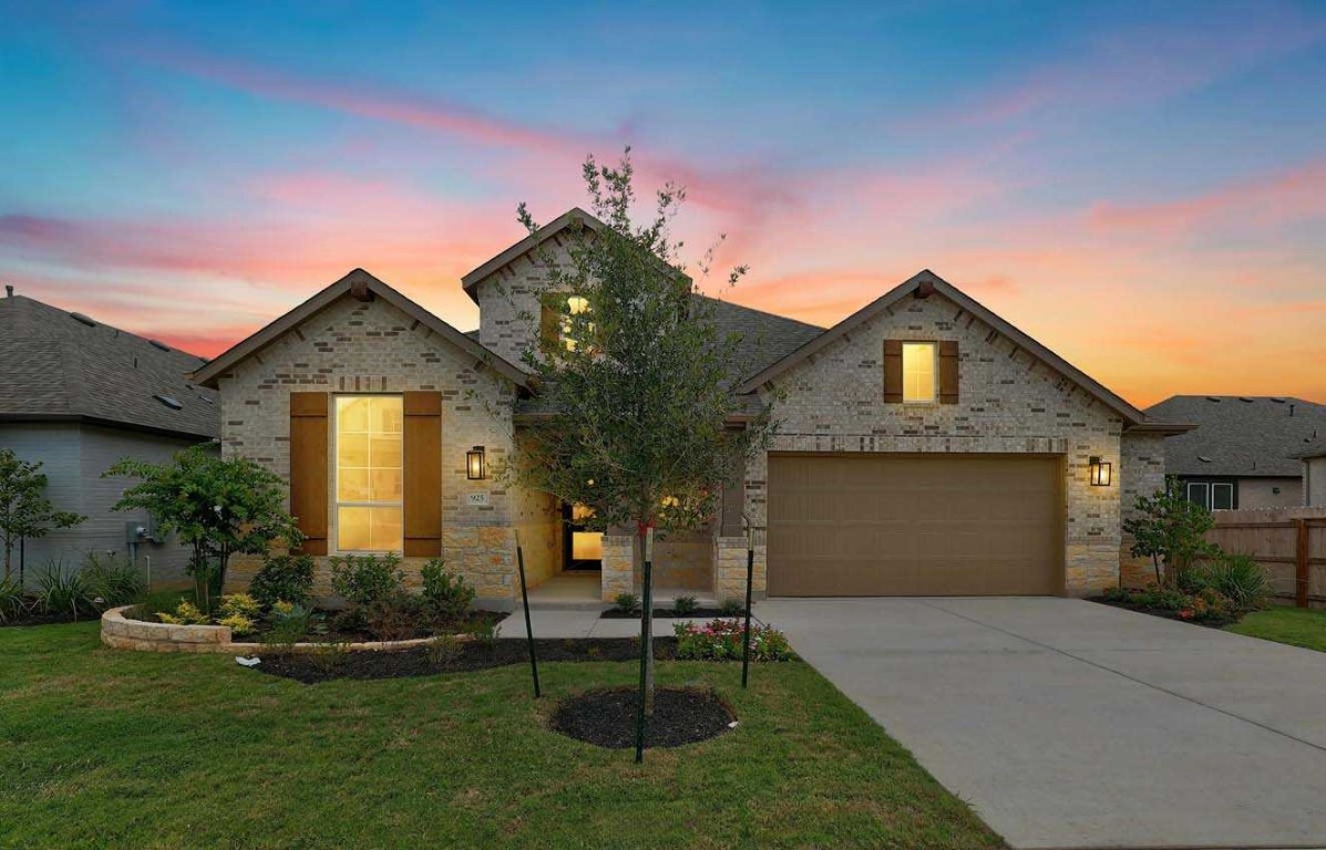 925 Willie Rnch Way Leander, TX 78641 - Photo 1 of 1 a front view of a house with a garden and plants