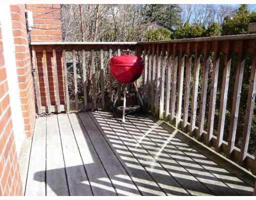 Patio/Deck. Deck situated off kitchen with stairs leading to yard below.