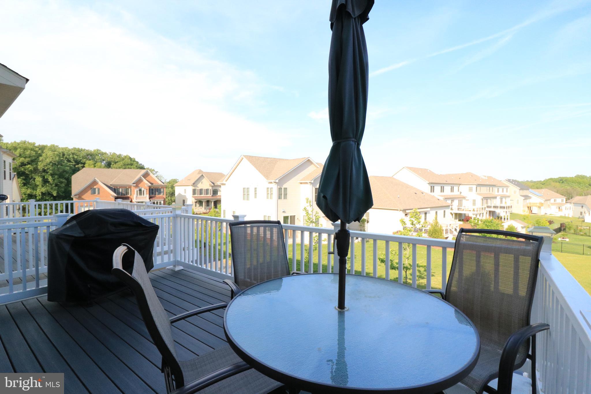 13411 Deer Highlands Way Silver Spring, MD 20906 - Photo 19 of 32 a view of a balcony with furniture