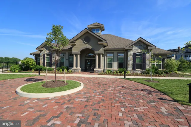 a front view of a house with swimming pool