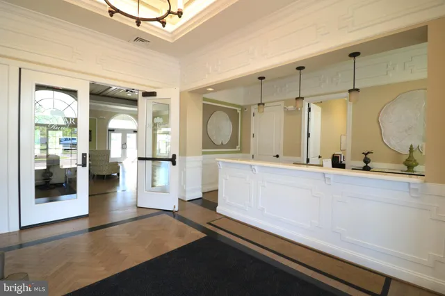 a bathroom with a double vanity sink a mirror and shower