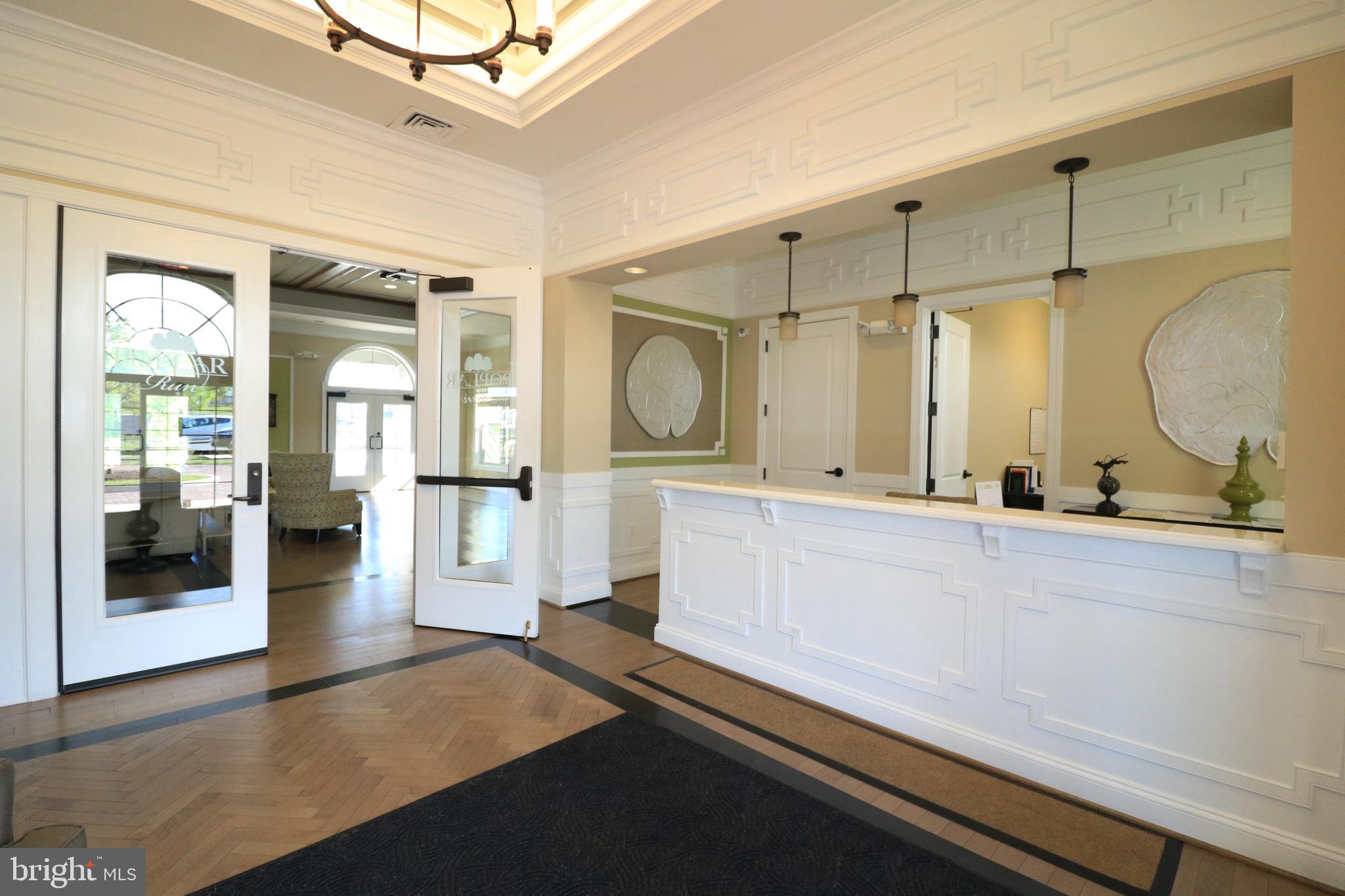 13411 Deer Highlands Way Silver Spring, MD 20906 - Photo 32 of 32 a bathroom with a double vanity sink a mirror and shower