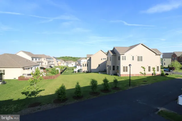 a view of a wrought iron fences in front of house