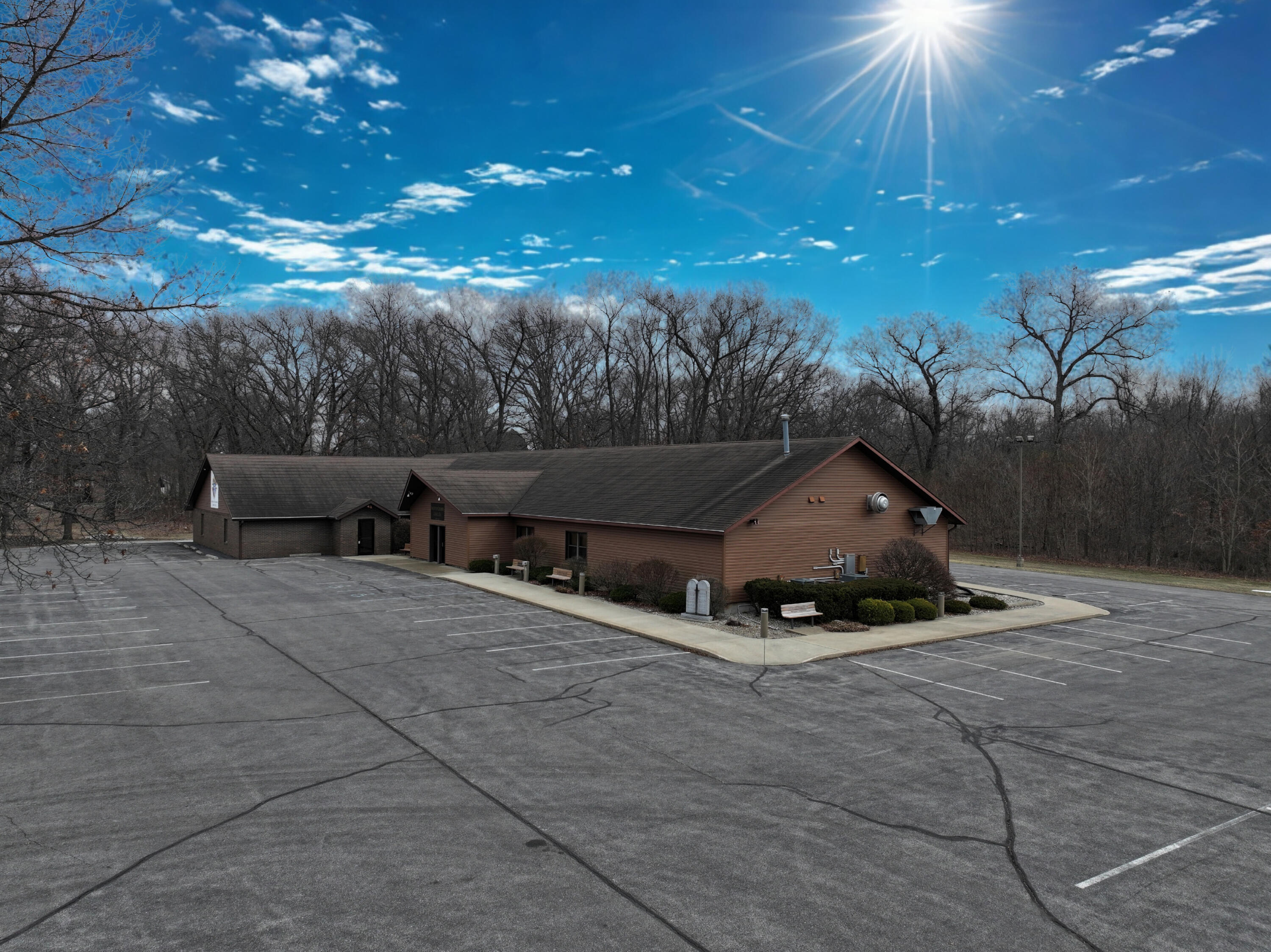 340 East 50 North Winamac, IN 46996 - Photo 13 of 38 a house with trees in front of it