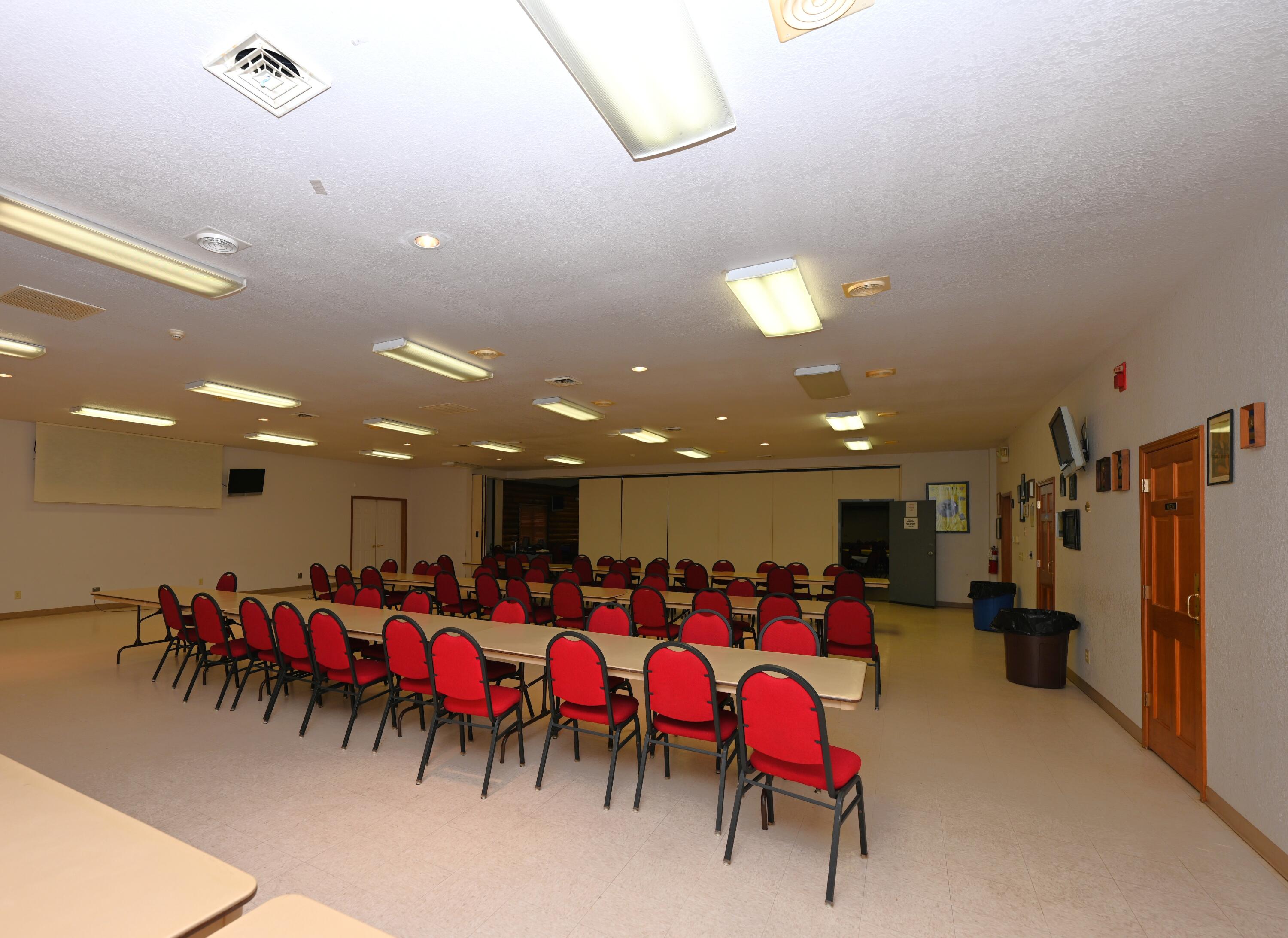 340 East 50 North Winamac, IN 46996 - Photo 19 of 38 a group of people sitting in a room with gym equipment