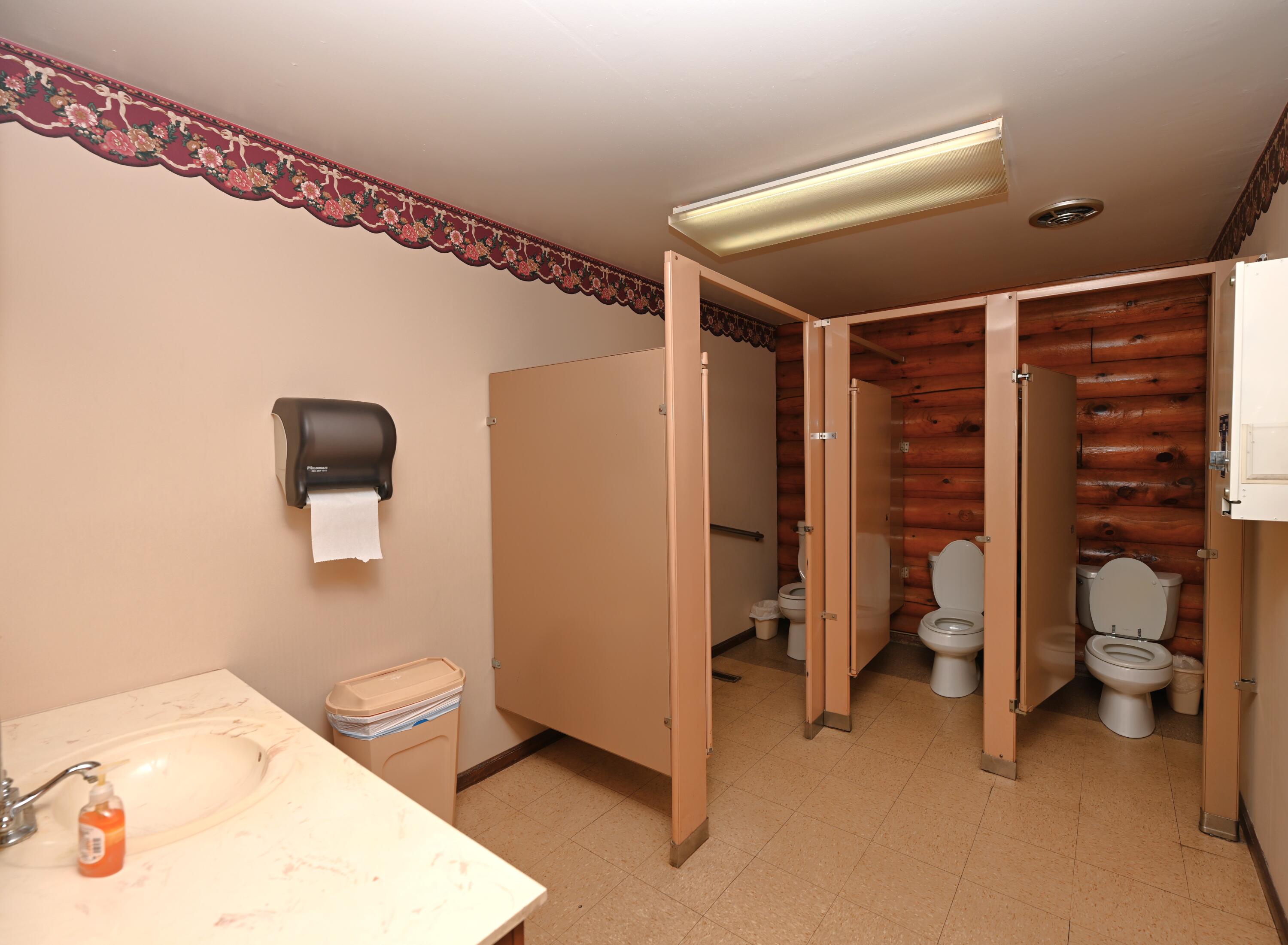 340 East 50 North Winamac, IN 46996 - Photo 24 of 38 a bathroom with a toilet sink and shower