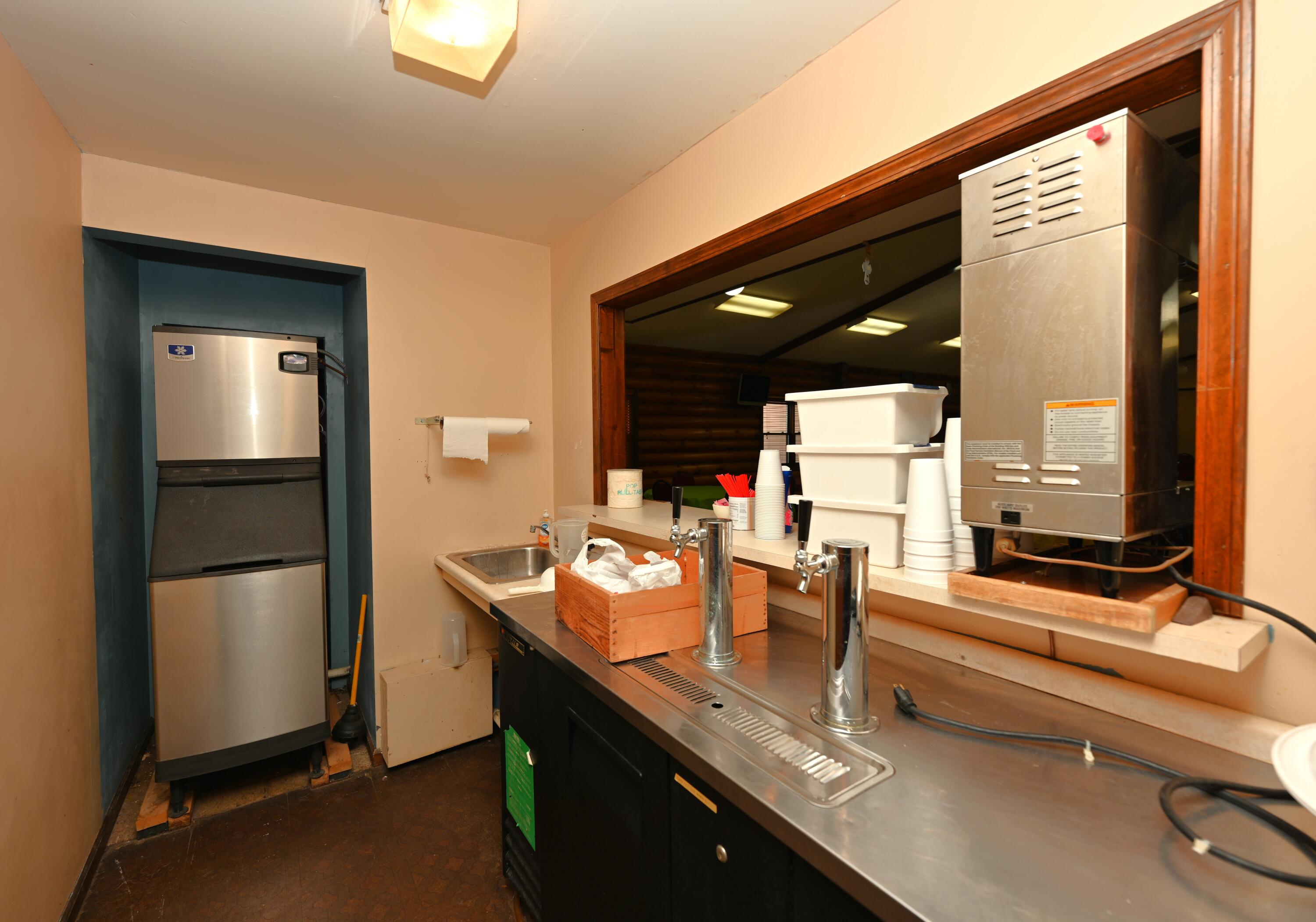 340 East 50 North Winamac, IN 46996 - Photo 27 of 38 a room with sink and mirror