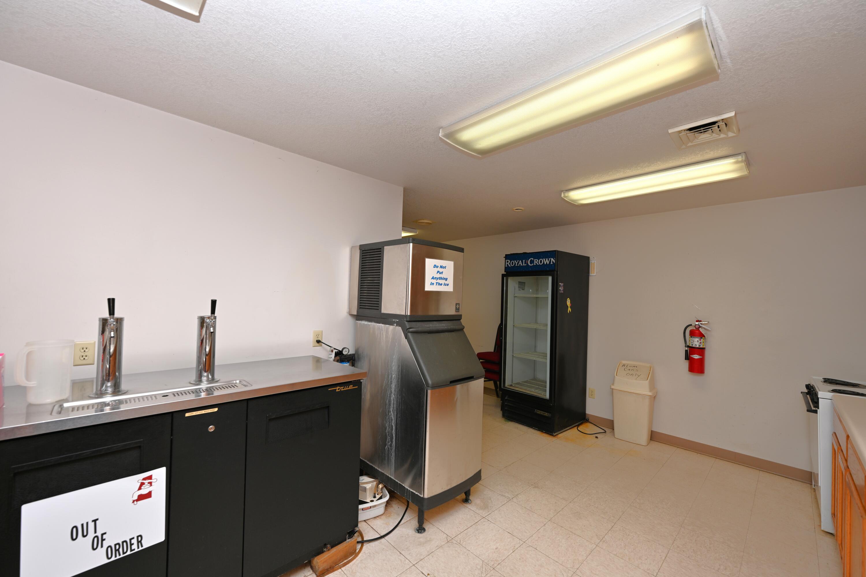 340 East 50 North Winamac, IN 46996 - Photo 36 of 38 a kitchen with a refrigerator and sink